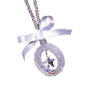 Sparkling crystal star pendant for car rearview mirror with silver alloy chain reflecting sunlight