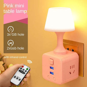 Minimalist cup-shaped LED night light in white with remote control and USB port for phone charging