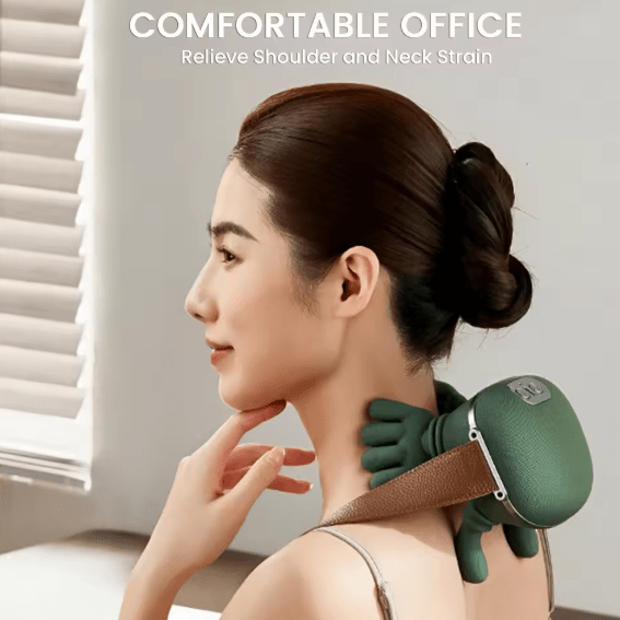 Close-up of a lightweight grey neck and shoulder massager with dual-palm kneading nodes on a soft-touch fabric surface.