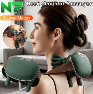 Close-up of a lightweight grey neck and shoulder massager with dual-palm kneading nodes on a soft-touch fabric surface.