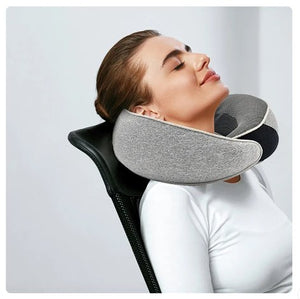 Grey memory foam U-shaped travel pillow with 360-degree neck support and travel sleep accessories.